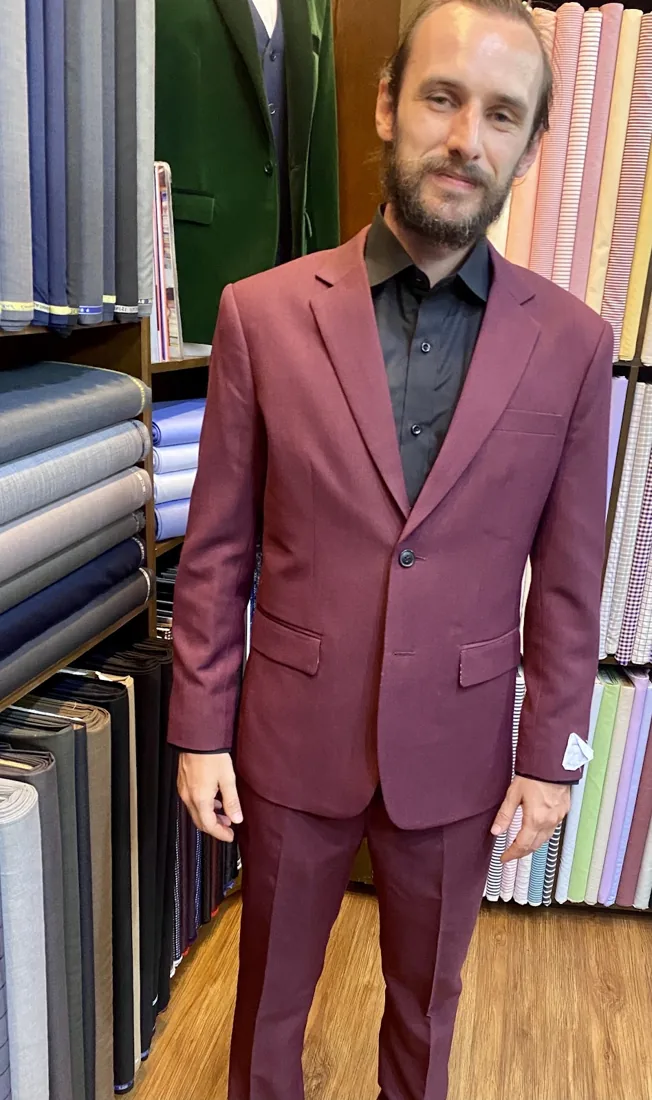 Client in a burgundy check bespoke suit by G.Armani Suit
