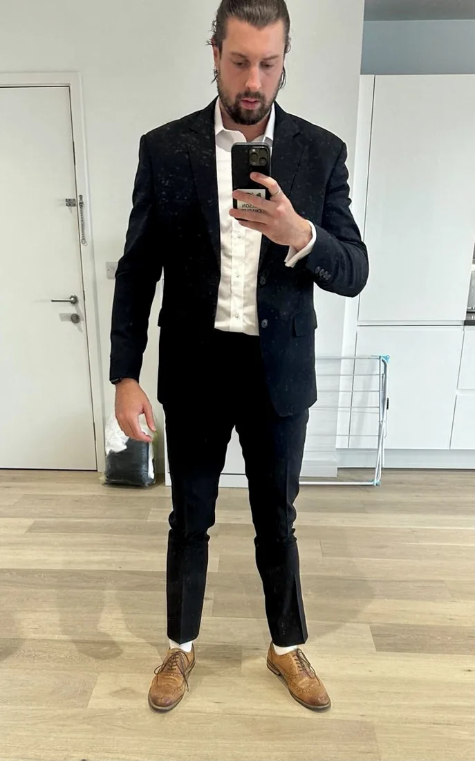 Client in a black velvet dinner jacket
