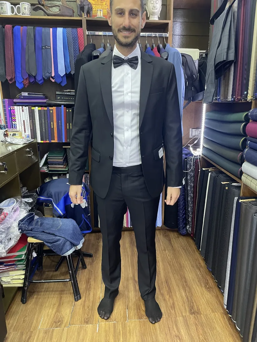 Client in a black tuxedo
