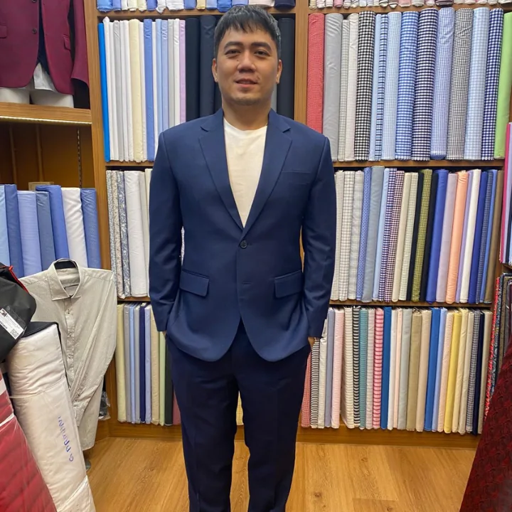 Client in a navy custom suit