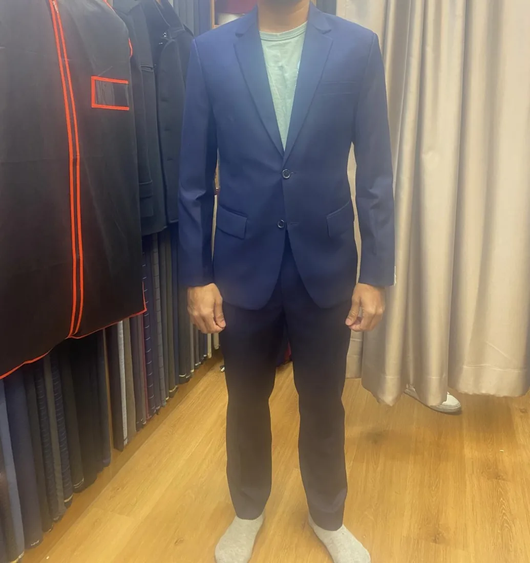 Client in a navy tailored suit
