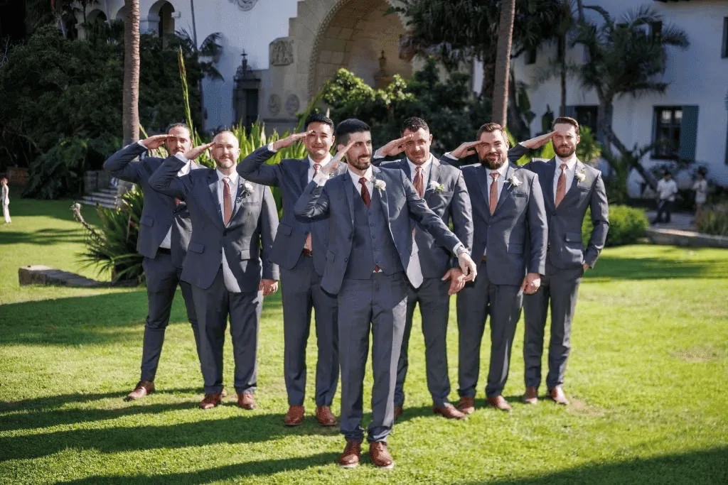 Groom and groomsmen in coordinated bespoke suits by G.Armani Suit