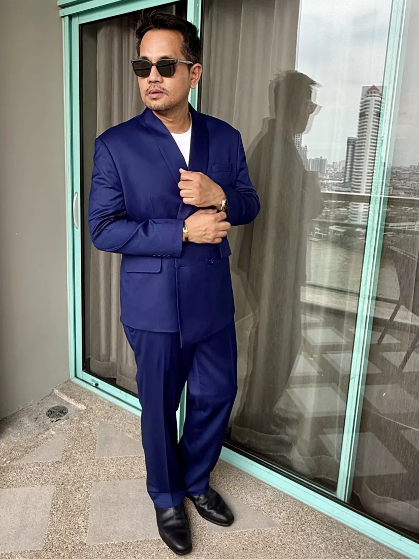 Mark Pasayan in a bespoke suit by G.Armani Suit