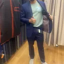 Hifaz Hizbullah in a bespoke suit by G.Armani Suit