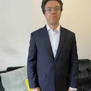 Michael Arnold in a bespoke suit by G.Armani Suit