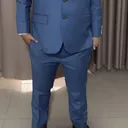 Vansoh Edi in a bespoke suit by G.Armani Suit